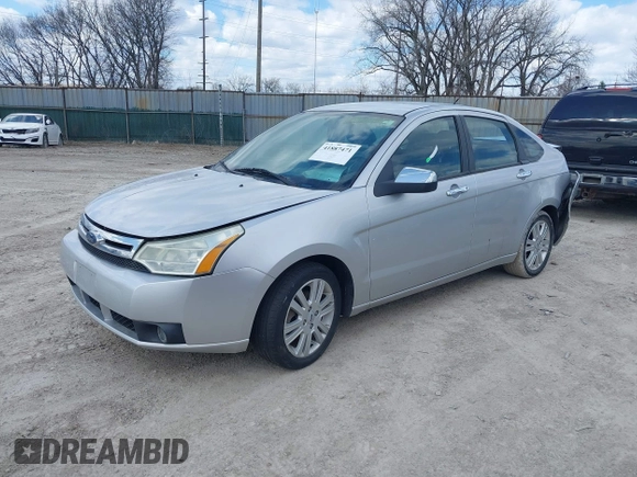 2010 Ford Focus SEL with VIN 1FAHP3HN3AW131735, listed as a IAAI auction lot 41887471 with 114,320 mi miles. Bid and sale history available at carsss.com. Image 2.