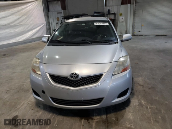2010 Toyota Yaris with VIN JTDBT4K3XA1382385, listed as a Copart auction lot 48544795 with 169,664 mi miles and Salvage Title. Bid and sale history available at DreamBid. Image 5.