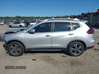 2019 Nissan Rogue SV with VIN JN8AT2MT9KW263300, listed as a IAAI auction lot 41853629 with 104,654 mi miles and . Bid and sale history available at carsss.com. Image 14.