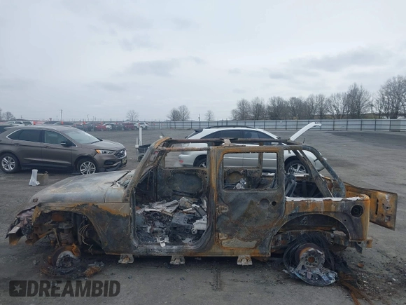 2008 Jeep Wrangler Unlimited Sahara with VIN 1J4GA59158L525516, listed as a IAAI auction lot 41611079 with Not Provided miles and . Bid and sale history available at DreamBid. Image 14.