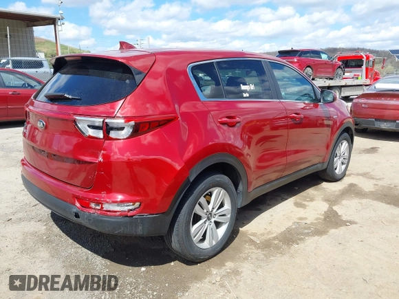 2017 Kia Sportage LX with VIN KNDPMCAC4H7229930, listed as a IAAI auction lot 42011160 with 96,082 mi miles and . Bid and sale history available at carsss.com. Image 4.