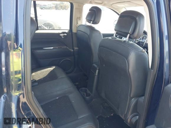 2014 Jeep Compass Latitude with VIN 1C4NJCEB2ED883243, listed as a IAAI auction lot 41989007 with 138,192 mi miles. Bid and sale history available at carsss.com. Image 8.