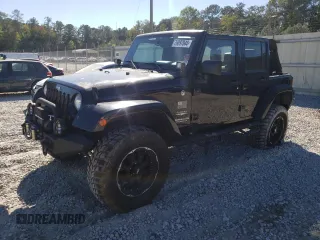 2007 Jeep Wrangler Unlimited Sahara with VIN 1J4GA59197L141821, listed as a Copart auction lot 76897044 with 124,070 mi miles and Salvage title. Bid and sale history available at DreamBid. Image 1.