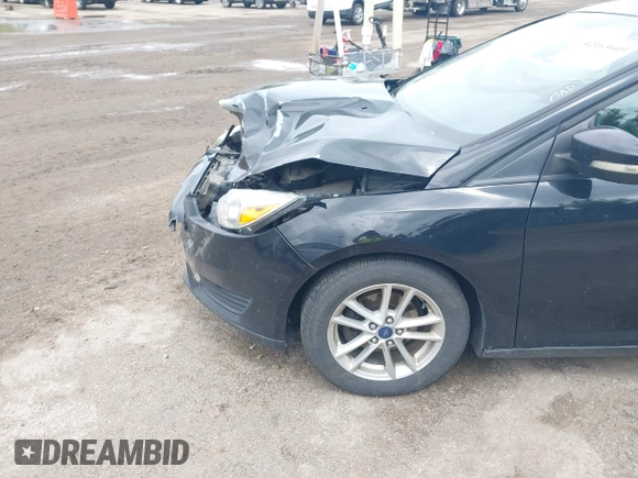 2017 Ford Focus SE with VIN 1FADP3F25HL239809, listed as a IAAI auction lot 42163669 with 140,220 mi miles and . Bid and sale history available at DreamBid. Image 12.