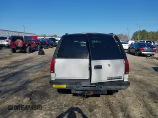 1996 Chevrolet Suburban with VIN 3GNFK16RXTG135350, listed as a IAAI auction lot 41482918 with 157,971 mi miles. Bid and sale history available at carsss.com. Image 17.