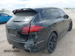2014 Porsche Cayenne GTS with VIN WP1AD2A25ELA71350, listed as a IAAI auction lot 42031766 with 104,184 mi miles and . Bid and sale history available at DreamBid. Image 4.