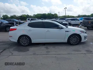 2015 Kia Optima SX Turbo with VIN 5XXGR4A60FG503940, listed as a IAAI auction lot 41944773 with 214,914 mi miles. Bid and sale history available at carsss.com. Image 13.