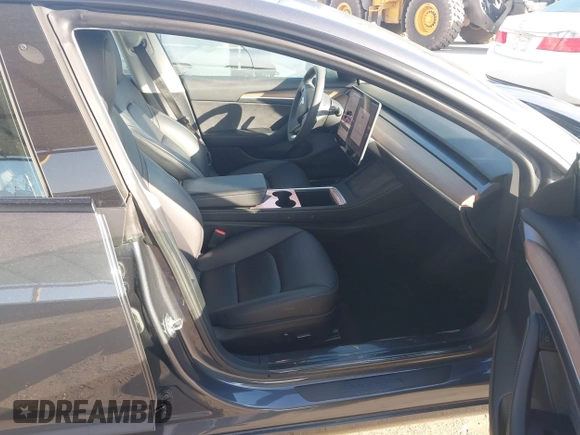 2023 Tesla Model 3 with VIN 5YJ3E1EA5PF697201, listed as a IAAI auction lot 41589422 with 16,862 mi miles and . Bid and sale history available at carsss.com. Image 5.