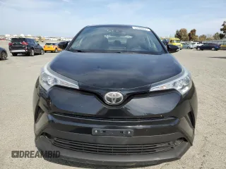 2018 Toyota C-HR XLE z VIN NMTKHMBXXJR024077, wystawiony jako Copart lot #53398025 z przebiegiem 97 079 mil mil oraz Szkoda całkowita • Salvage title. Historia ofert i sprzedaży dostępna na DreamBid. Obrazek 5.