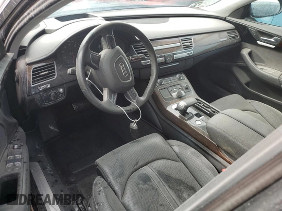 2018 Audi A8 z VIN WAU44AFD0JN000782, wystawiony jako Copart lot #68575924 z przebiegiem 99 098 mil mil oraz Nie do naprawy • Non repairable. Historia ofert i sprzedaży dostępna na DreamBid. Obrazek 9.