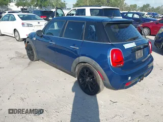 2016 MINI Cooper Hardtop 4 Door S with VIN WMWXU3C54G2D30766, listed as a IAAI auction lot 42008026 with 101,898 mi miles. Bid and sale history available at carsss.com. Image 3.