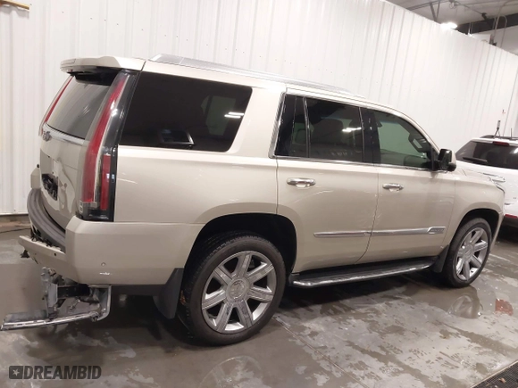 2017 Cadillac Escalade Luxury with VIN 1GYS4BKJ5HR254402, listed as a IAAI auction lot 41492160 with 76,419 mi miles. Bid and sale history available at carsss.com. Image 13.