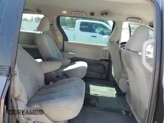 2014 Toyota Sienna L z VIN 5TDZK3DC0ES409479, wystawiony jako Copart lot #51643485 z przebiegiem 119 709 mil mil oraz Szkoda całkowita • Salvage title. Historia ofert i sprzedaży dostępna na DreamBid. Obrazek 11.
