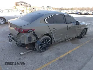 2024 Mazda 3 Carbon Edition with VIN 3MZBPBXY0RM404743, listed as a IAAI auction lot 41291652 with 18,231 mi miles and . Bid and sale history available at DreamBid. Image 4.