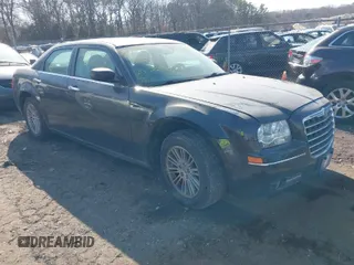 2010 Chrysler 300 Touring with VIN 2C3CA5CV1AH230081, listed as a IAAI auction lot 41651659 with 999,999 mi miles. Bid and sale history available at carsss.com. Image 1.