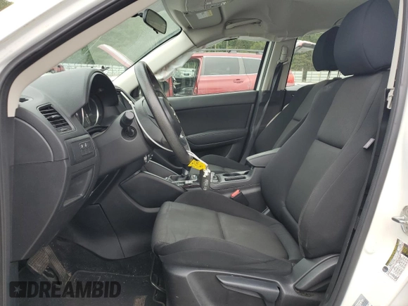 2016 Mazda CX-5 Sport with VIN JM3KE2BY0G0843786, listed as a Copart auction lot 54451275 with 111,363 mi miles and Salvage title. Bid and sale history available at DreamBid. Image 7.
