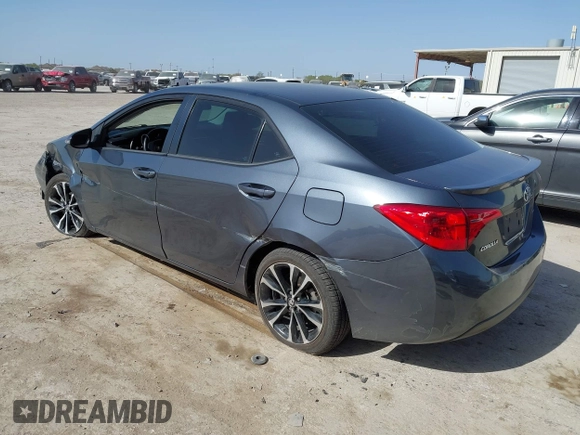 2019 Toyota Corolla L with VIN 5YFBURHE9KP910059, listed as a IAAI auction lot 41856905 with 104,096 mi miles and . Bid and sale history available at DreamBid. Image 3.