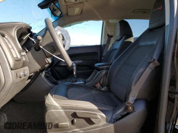 2021 GMC Canyon 4WD AT4 w/Cloth with VIN 1GTG6FEN9M1254293, listed as a Copart auction lot 87163874 with 33,645 mi miles and Salvage Title. Bid and sale history available at carsss.com. Image 7.