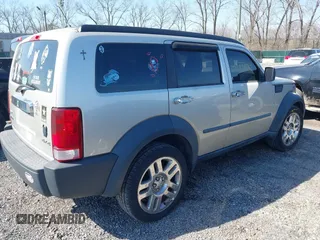 2008 Dodge Nitro SXT with VIN 1D8GU28K68W271921, listed as a IAAI auction lot 41772124 with 233,078 mi miles. Bid and sale history available at carsss.com. Image 4.