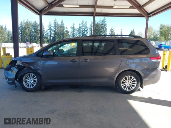 2011 Toyota Sienna XLE AAS with VIN 5TDYK3DC7BS047822, listed as a IAAI auction lot 42073635 with 150,424 mi miles. Bid and sale history available at carsss.com. Image 15.