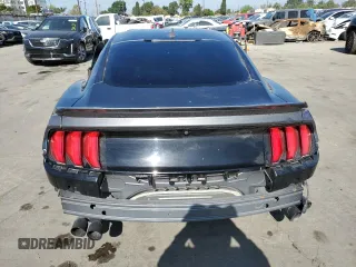 2021 Ford Mustang GT z VIN 1FA6P8CF9M5103856, wystawiony jako Copart lot #56322045 z przebiegiem 27 499 mil mil oraz Szkody całkowita. Historia ofert i sprzedaży dostępna na DreamBid. Obrazek 6.