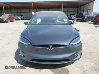 2017 Tesla Model X 90D with VIN 5YJXCBE22HF079194, listed as a IAAI auction lot 41895591 with 102,437 mi miles and . Bid and sale history available at DreamBid. Image 12.
