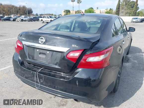 2018 Nissan Altima SR with VIN 1N4AL3AP7JC279459, listed as a IAAI auction lot 41901831 with 104,798 mi miles and . Bid and sale history available at DreamBid. Image 4.