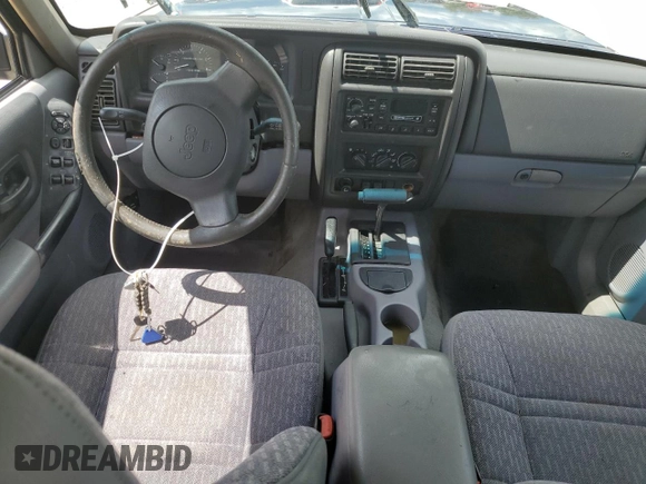 1998 Jeep Cherokee Sport with VIN 1J4FJ68S1WL149793, listed as a Copart auction lot 73976814 with 0 mi miles and Salvage Title. Bid and sale history available at carsss.com. Image 8.