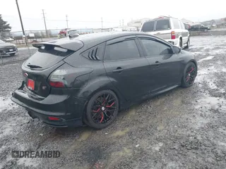 2014 Ford Focus ST with VIN 1FADP3L91EL441379, listed as a IAAI auction lot 41092598 with 58,670 mi miles and . Bid and sale history available at carsss.com. Image 4.