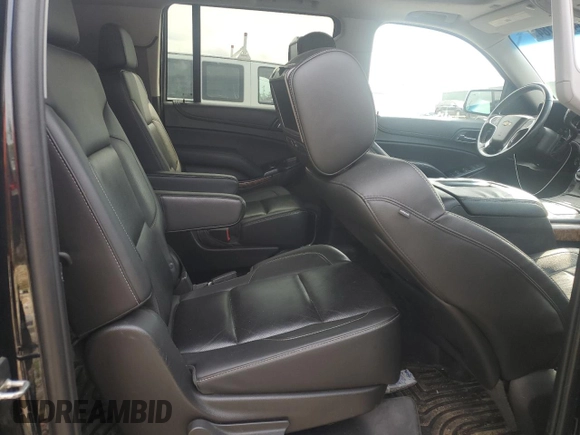 2015 Chevrolet Suburban LTZ with VIN 1GNSKKKC8FR199218, listed as a Copart auction lot 64147184 with 181,676 mi miles and Salvage Title. Bid and sale history available at DreamBid. Image 11.
