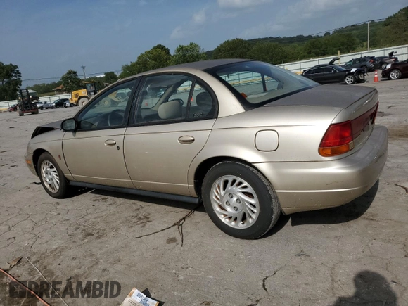 1998 Saturn SL with VIN 1G8ZK5270WZ240303, listed as a Copart auction lot 65364164 with 156,699 mi miles and Salvage title. Bid and sale history available at DreamBid. Image 2.