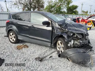 2014 Ford Escape SE with VIN 1FMCU0GX1EUA19463, listed as a Copart auction lot 51251195 with 122,249 mi miles and Salvage Title. Bid and sale history available at carsss.com. Image 4.