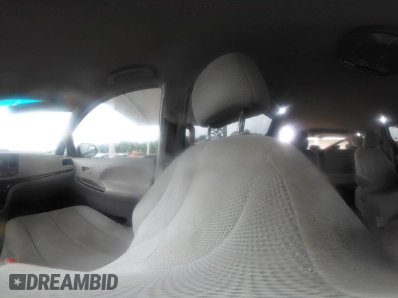 2014 Toyota Sienna L with VIN 5TDZK3DC9ES473780, listed as a IAAI auction lot 42245274 with 203,060 mi miles and . Bid and sale history available at DreamBid. Image 19.