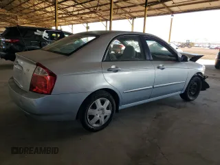 2006 Kia Spectra EX with VIN KNAFE121465332510, listed as a Copart auction lot 77211974 with 148,964 mi miles and Salvage Title. Bid and sale history available at carsss.com. Image 3.