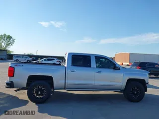 2015 Chevrolet Silverado 1500 LTZ with VIN 3GCUKSEC3FG338376, listed as a IAAI auction lot 42007176 with 145,472 mi miles. Bid and sale history available at carsss.com. Image 14.
