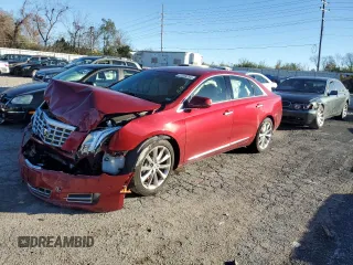 2014 Cadillac XTS Luxury z VIN 2G61M5S39E9118920, wystawiony jako Copart lot #81369254 z przebiegiem Nie podano mil oraz Szkody całkowita. Historia ofert i sprzedaży dostępna na DreamBid. Obrazek 1.