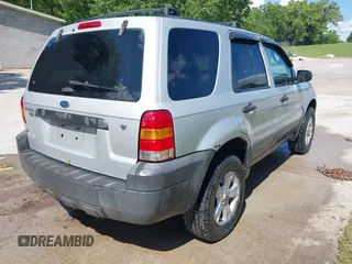 2006 Ford Escape XLT with VIN 1FMYU93106KA12173, listed as a IAAI auction lot 42176724 with 219,471 mi miles and . Bid and sale history available at DreamBid. Image 4.