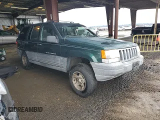 1997 Jeep Grand Cherokee TSi with VIN 1J4FX58S6VC602782, listed as a Copart auction lot 86605074 with 158,971 mi miles and Salvage Title. Bid and sale history available at carsss.com. Image 4.