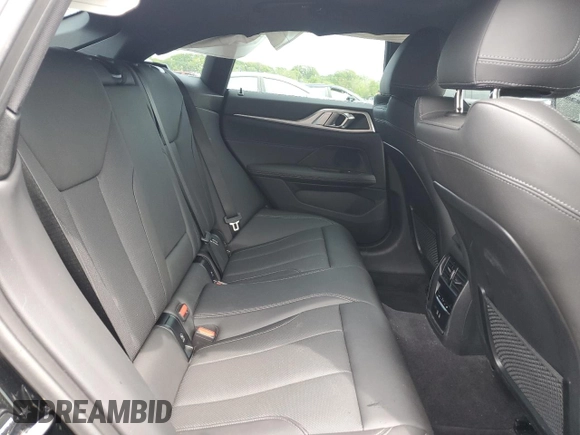 2024 BMW 4 Series 430i xDrive z VIN WBA73AV05RFP73980, wystawiony jako Copart lot #57059745 z przebiegiem 29 170 mil mil oraz Szkoda całkowita • Salvage title. Historia ofert i sprzedaży dostępna na DreamBid. Obrazek 10.