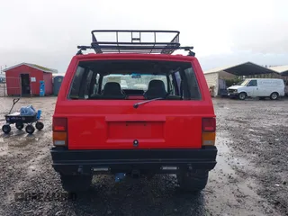 1996 Jeep Cherokee Sport with VIN 1J4FJ68S4TL244893, listed as a IAAI auction lot 41190369 with 192,459 mi miles and . Bid and sale history available at DreamBid. Image 17.