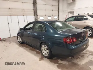 2009 Volkswagen Jetta z VIN 3VWHZ71K79M020139, wystawiony jako IAAI lot #42292767 z przebiegiem 156 619 mil mil oraz . Historia ofert i sprzedaży dostępna na DreamBid. Obrazek 3.