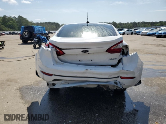 2019 Ford Fiesta SE z VIN 3FADP4BJ2KM147288, wystawiony jako Copart lot #55391125 z przebiegiem 83 887 mil mil oraz Szkoda całkowita • Salvage title. Historia ofert i sprzedaży dostępna na DreamBid. Obrazek 6.