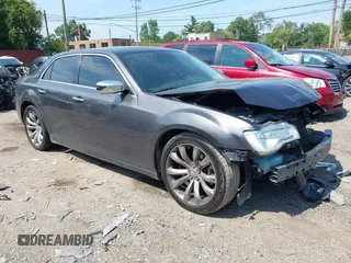 2017 Chrysler 300 300C with VIN 2C3CCAETXHH651127, listed as a IAAI auction lot 40206630 with 165,896 mi miles. Bid and sale history available at carsss.com. Image 1.