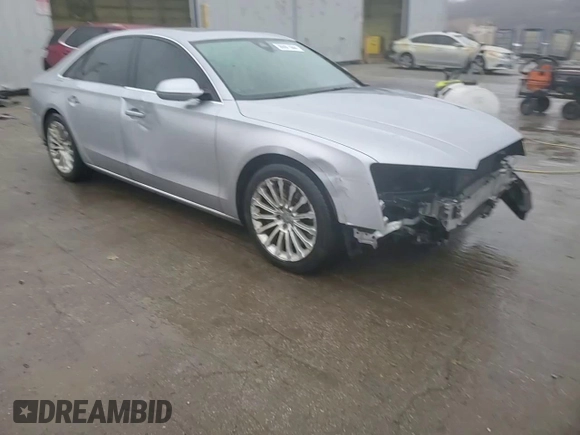 2015 Audi A8 z VIN WAUJGAFD0FN010021, wystawiony jako Copart lot #86861684 z przebiegiem 112 697 mil mil oraz Szkoda całkowita • Salvage title. Historia ofert i sprzedaży dostępna na DreamBid. Obrazek 14.