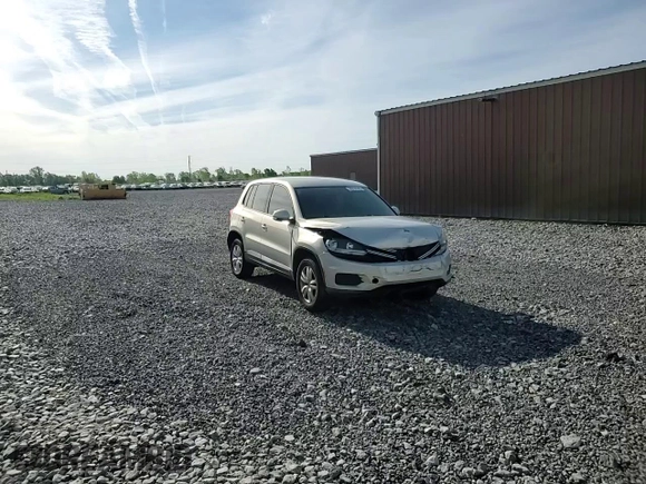 2013 Volkswagen Tiguan S with VIN WVGAV3AX9DW626065, listed as a Copart auction lot 58014145 with 128,858 mi miles and Salvage title. Bid and sale history available at DreamBid. Image 14.