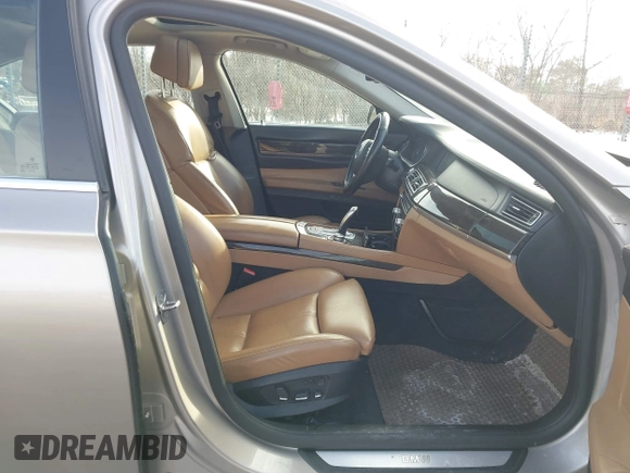 2012 BMW 7 Series 740i with VIN WBAKA4C58CDS99381, listed as a IAAI auction lot 41655715 with 112,731 mi miles and . Bid and sale history available at DreamBid. Image 5.