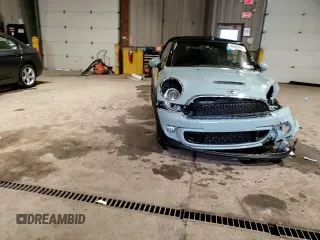2014 MINI Convertible S с VIN WMWZP3C59ET707581, выставлен на аукционе Copart как лот 46983865 с пробегом 42 746 миль миль и Списание • Salvage title. История ставок и продаж доступна на DreamBid. Изображение 11.