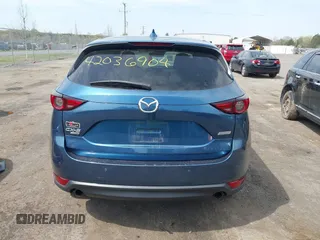 2019 Mazda CX-5 Signature with VIN JM3KFBEY1K0512880, listed as a IAAI auction lot 42036904 with 92,650 mi miles. Bid and sale history available at carsss.com. Image 17.