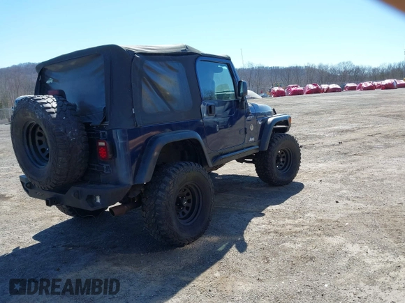 2003 Jeep Wrangler Sport with VIN 1J4FA49S03P343285, listed as a IAAI auction lot 41823684 with 201,723 mi miles and . Bid and sale history available at DreamBid. Image 4.