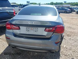 2015 Infiniti M Hybrid with VIN JN1EY1AP2FM510029, listed as a IAAI auction lot 41795913 with 152,475 mi miles. Bid and sale history available at carsss.com. Image 16.